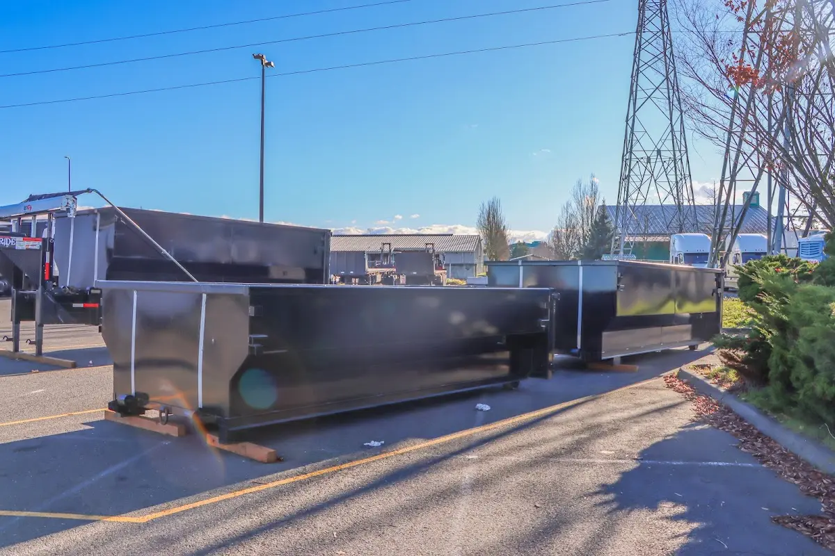 Roll-off dumpster ready for waste disposal at job site for Concrete Dumpster Rental in D'Iberville